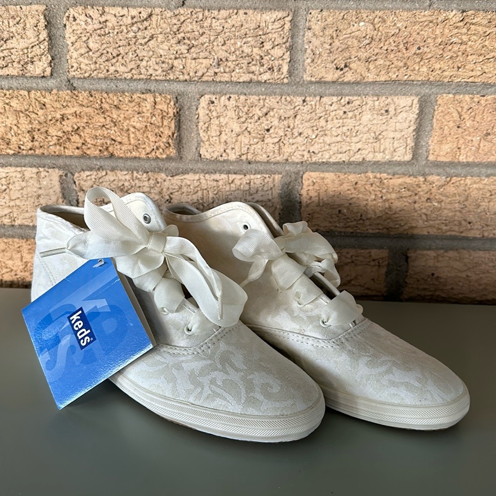 Keds floral design white high top ribbon laced sneakers